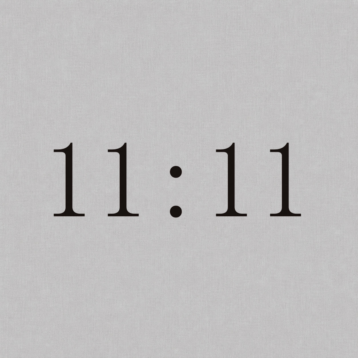 Fine line temporary tattoos design featuring the 11:11 angel number in a clean minimal serif style.