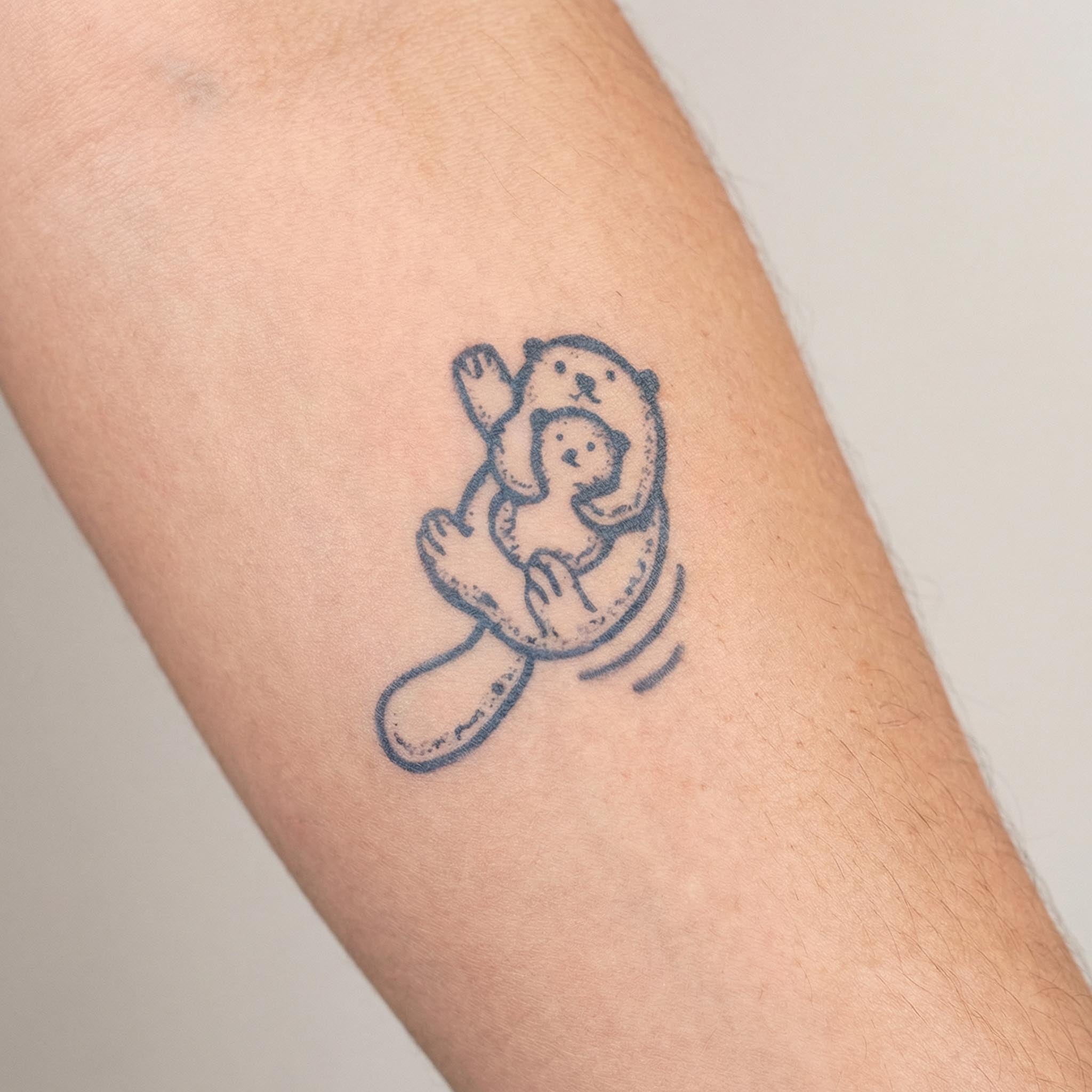 Parent Baby Otter Arm Tattoo Real Shot