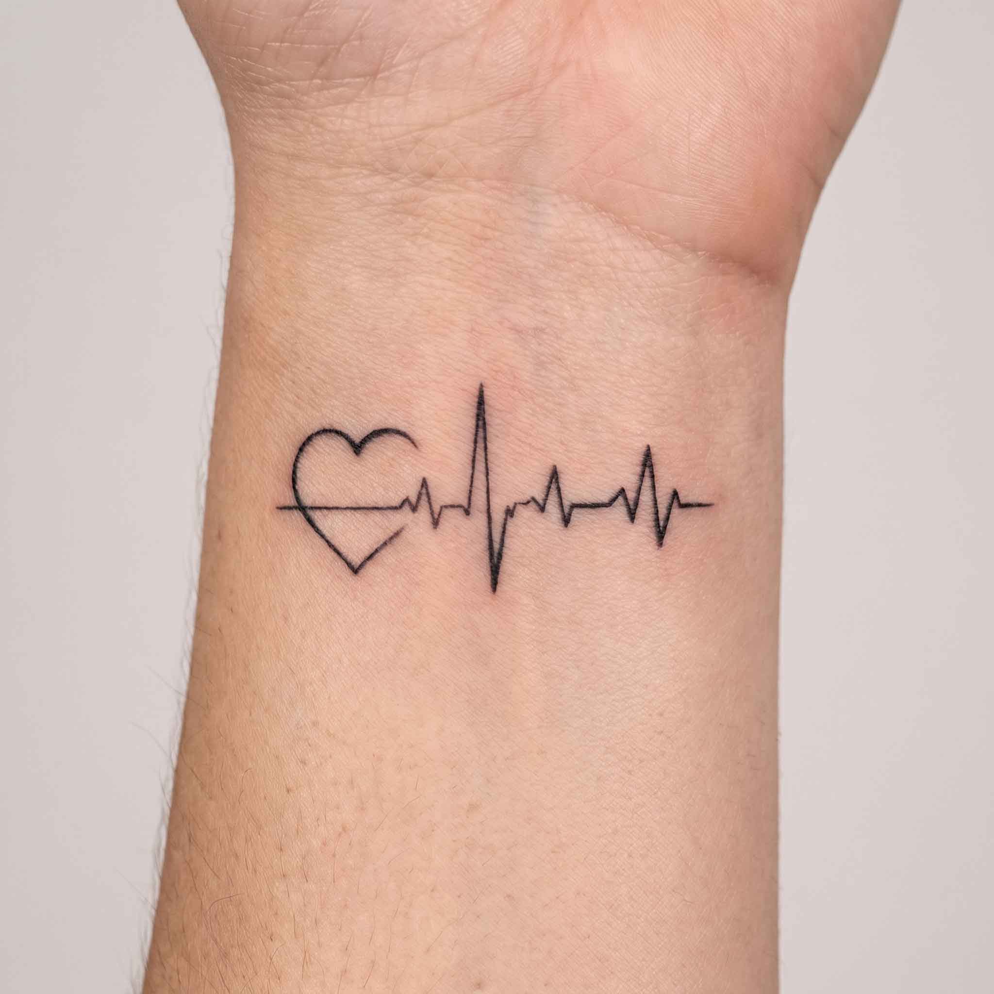 ECG heartbeat tattoo on wrist