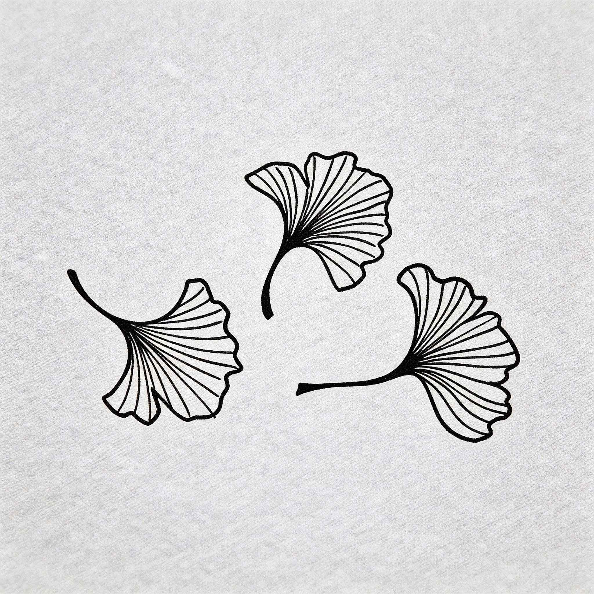 Ginkgo leaves temporary tattoo with delicate botanical line art details
