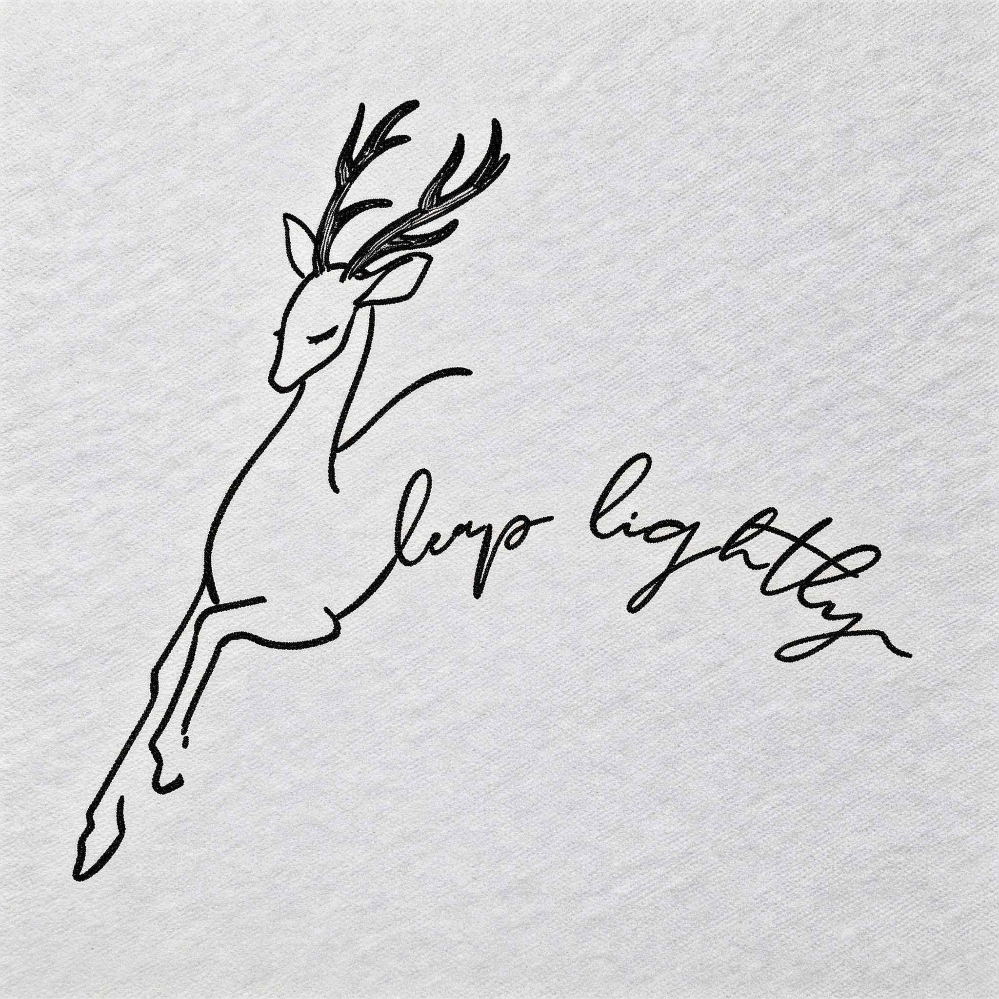 Deer line art temporary tattoo with Leap Lightly quote and minimal details