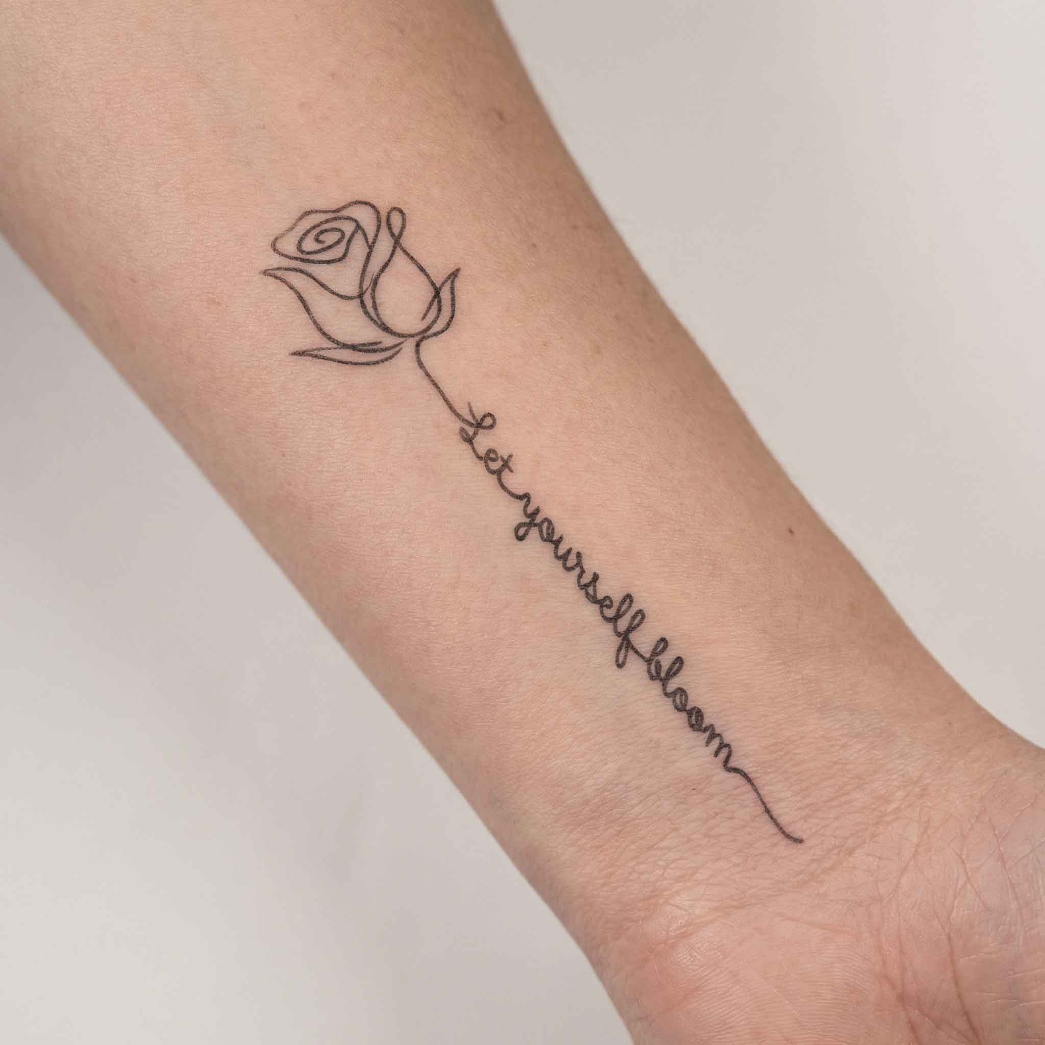Rose and “Let Yourself Bloom” semi-permanent temporary tattoo sticker with delicate floral line art