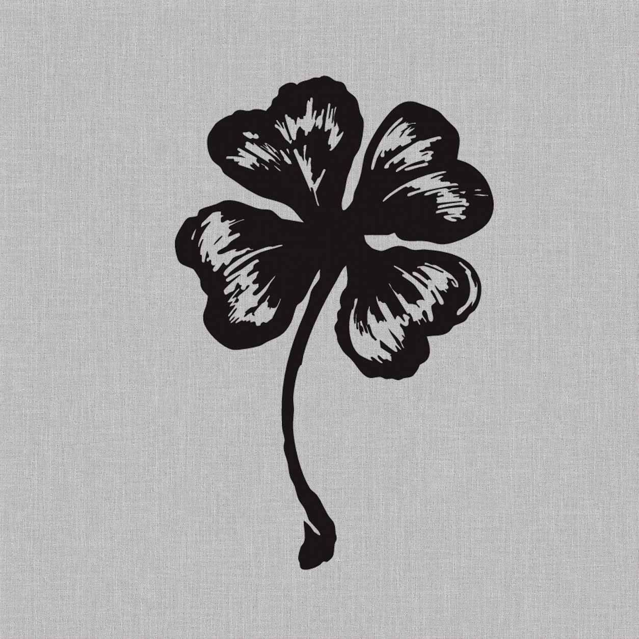 Temporary tattoo featuring a black four-leaf clover with textured leaves and a long curved stem.
