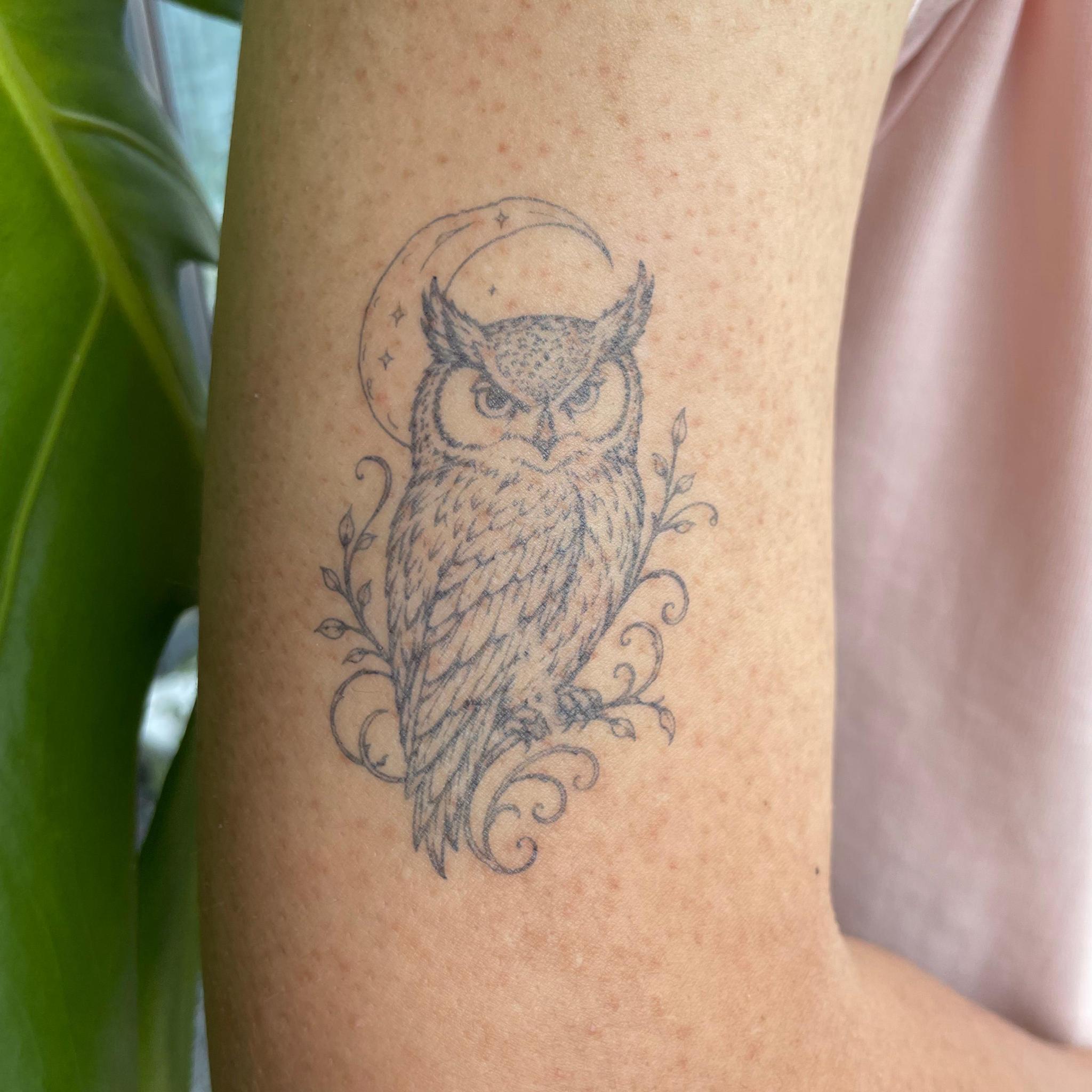 Moonlit owl herbal temporary tattoo on upper arm