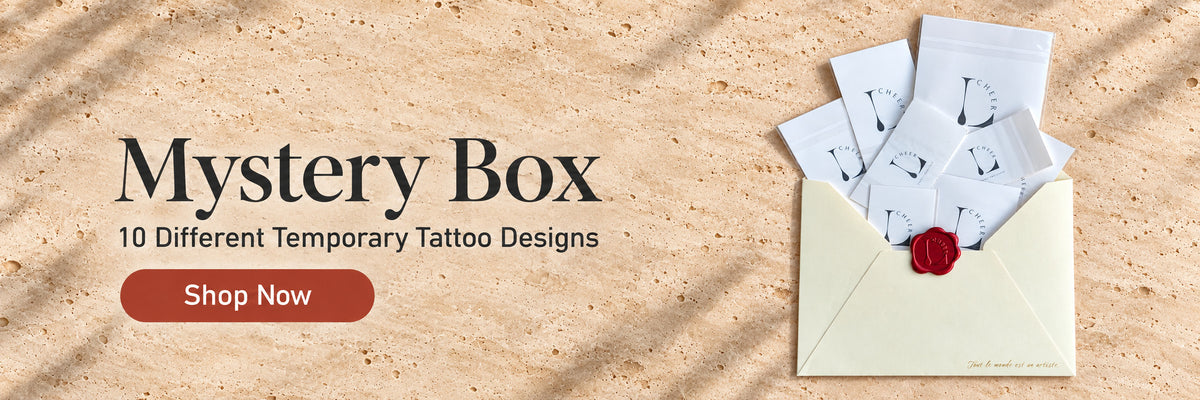 LCHEER temporary tattoo Mystery Box banner featuring 10 different tattoo designs packed in a cream envelope with a red wax seal.