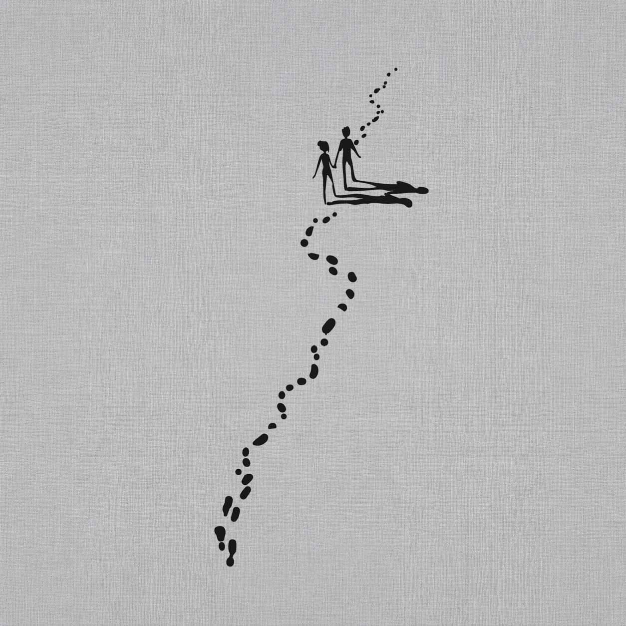 Temporary tattoo featuring two people walking together along a winding trail of footprints with long shadows.
