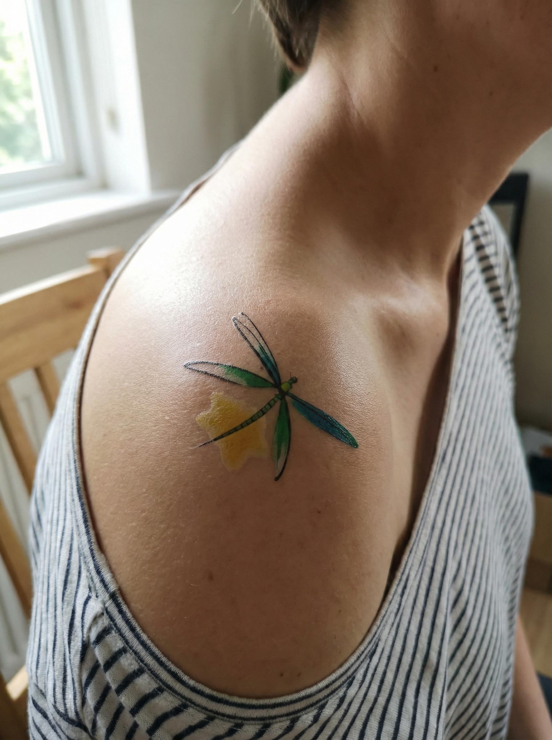 Dragonfly watercolor temporary tattoo on the shoulder