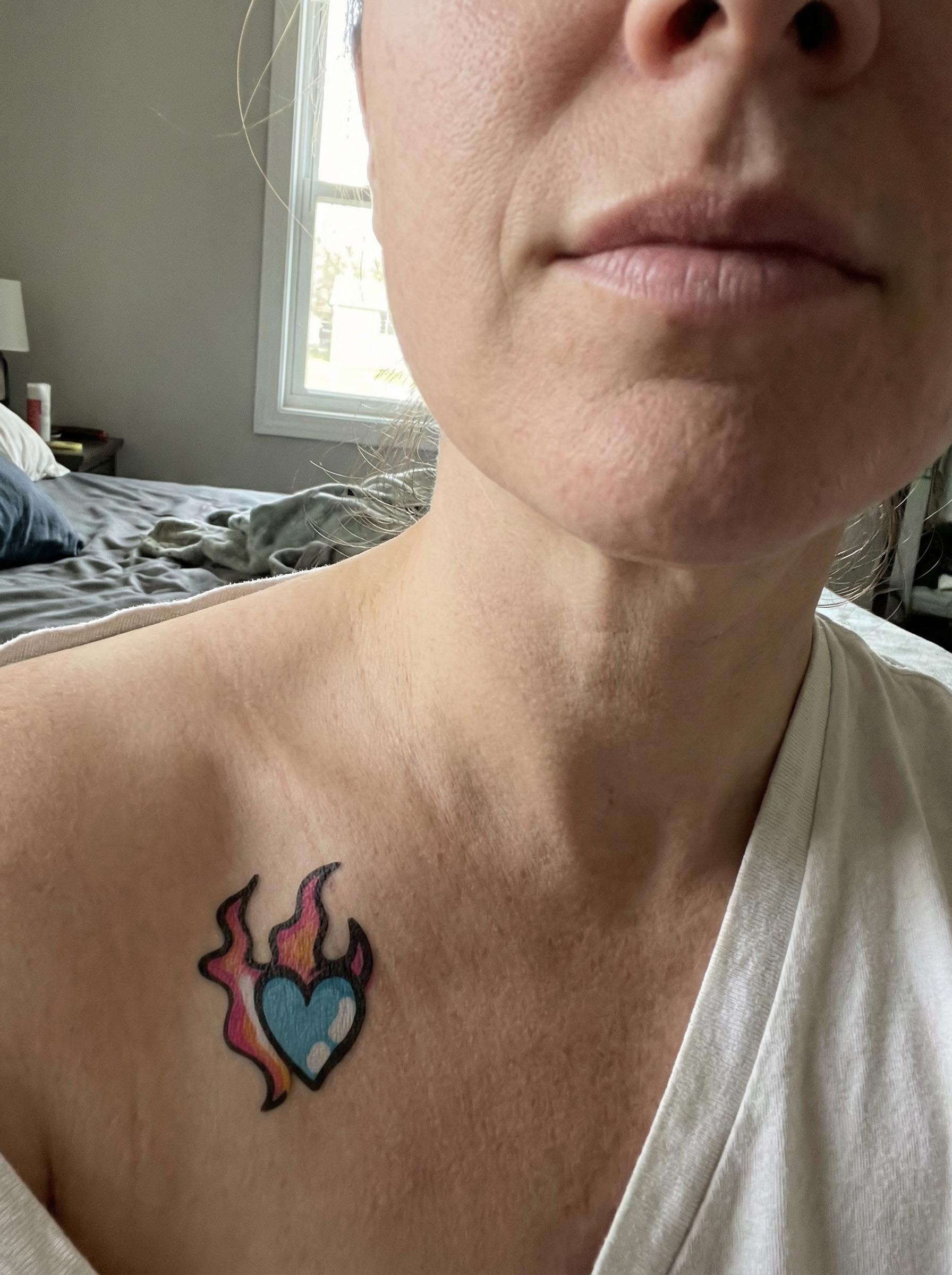 Y2K Flame Heart Collarbone Tattoo Real Shot