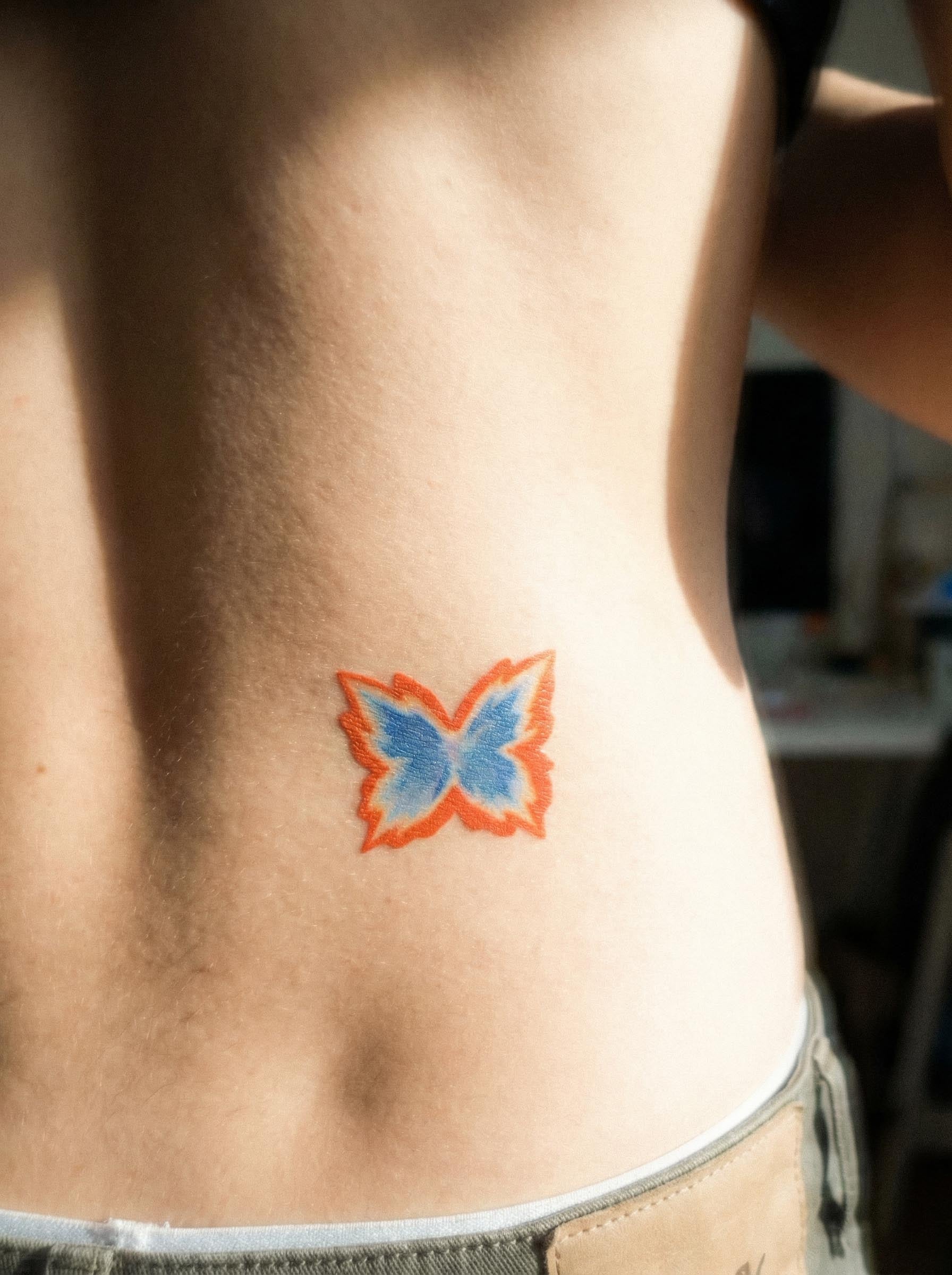 Flame Butterfly Lower Back Tattoo Real Shot