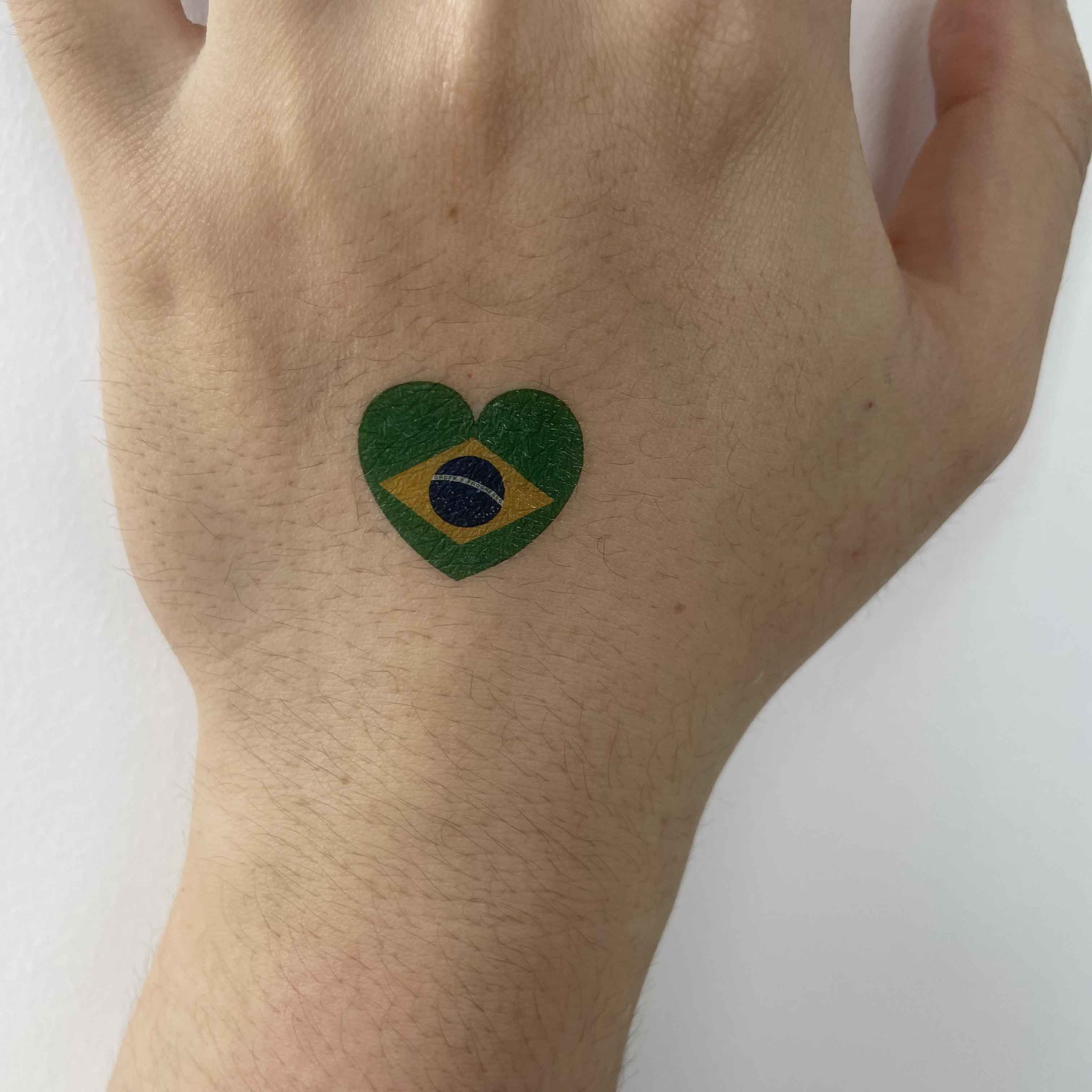 Brazil flag temporary tattoo worn on hand for football fan game day styling