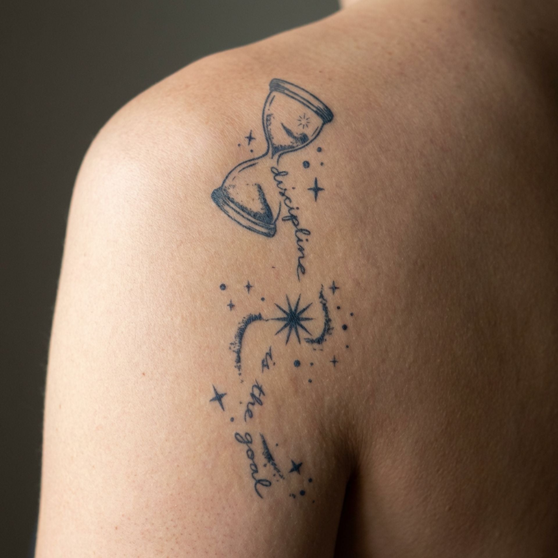 [Discipline_is_the_goal] temporary tattoo on collarbone in natural selfie