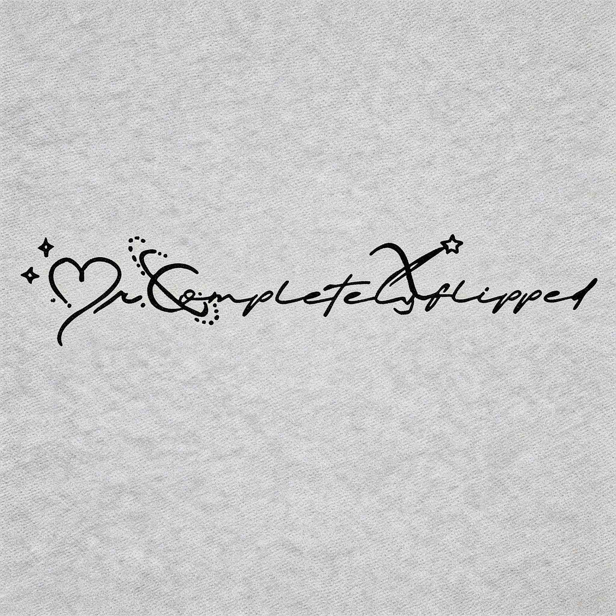 Completely Flipped word temporary tattoo with clean minimalist lettering
