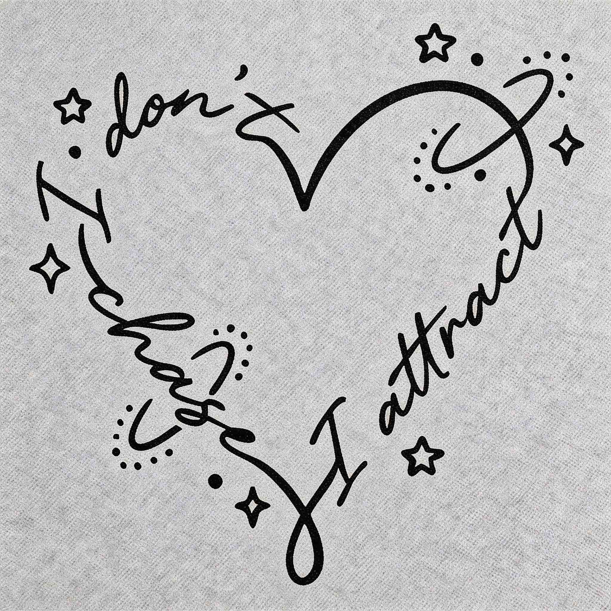 I Don’t Change I Attract temporary tattoo with heart-shaped script and star details