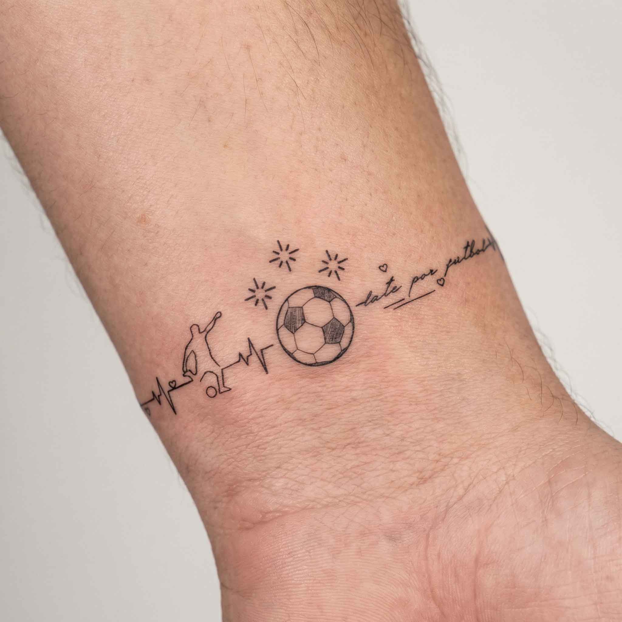 Football heartbeat temporary tattoo worn on the wrist