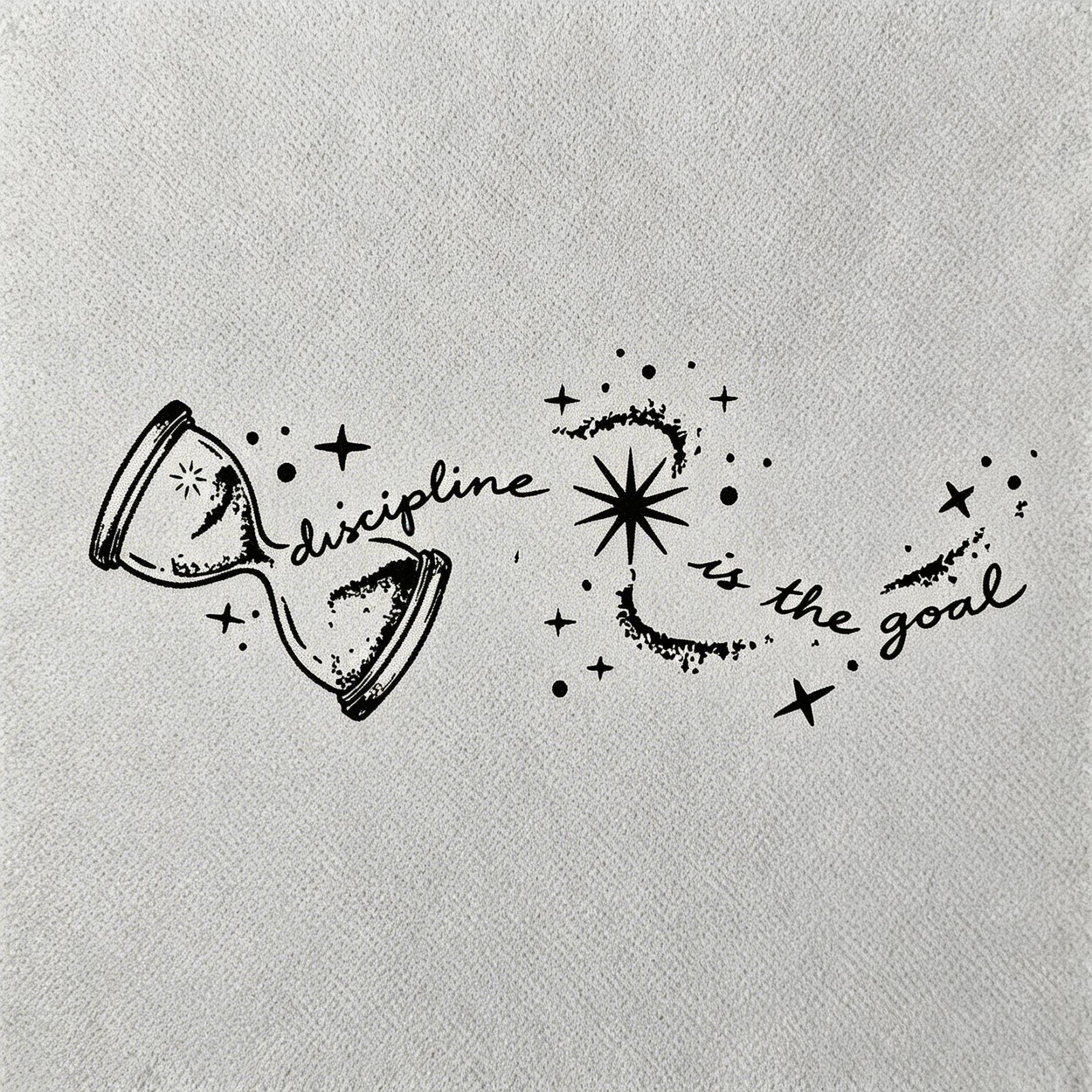 fine line Discipline is the goal temporary tattoo on forearm