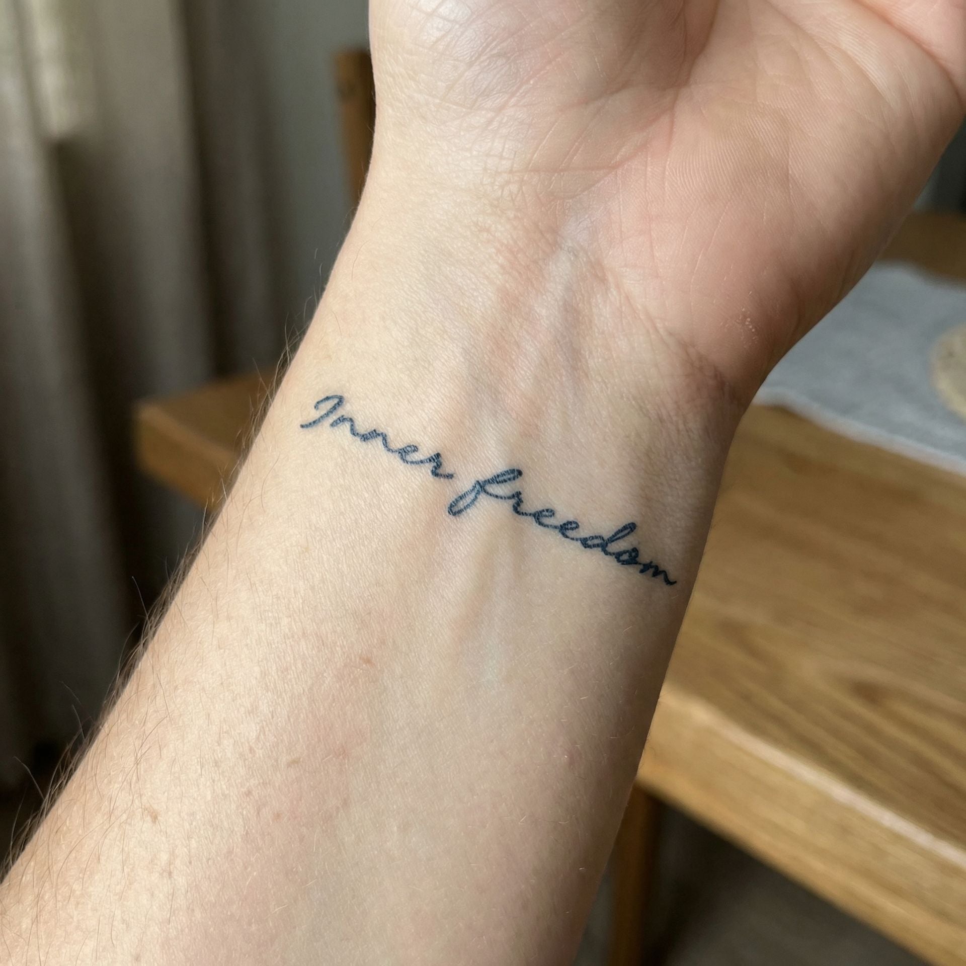 Minimalist quote temporary tattoos on skin