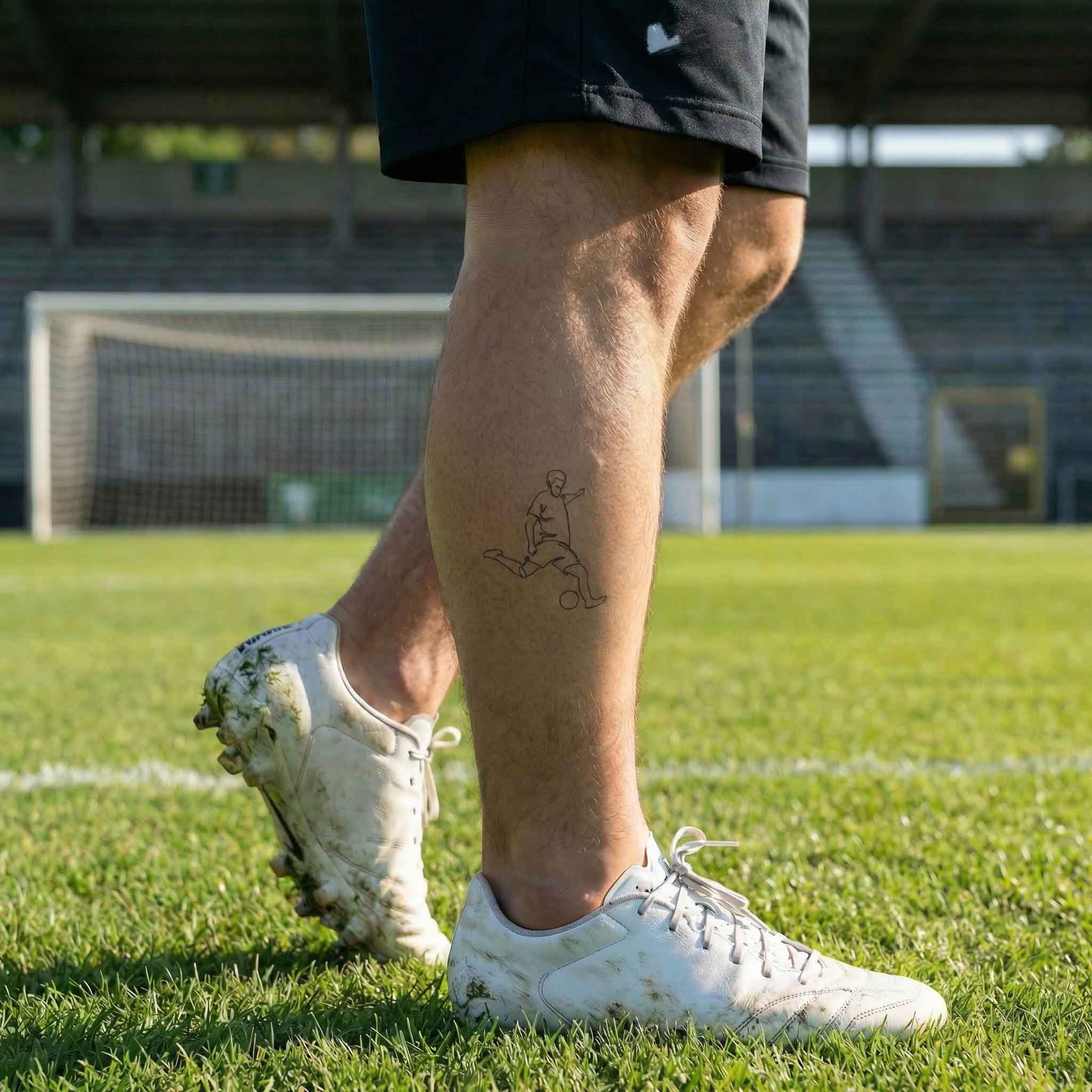Fine line soccer player tattoo worn on ankle
