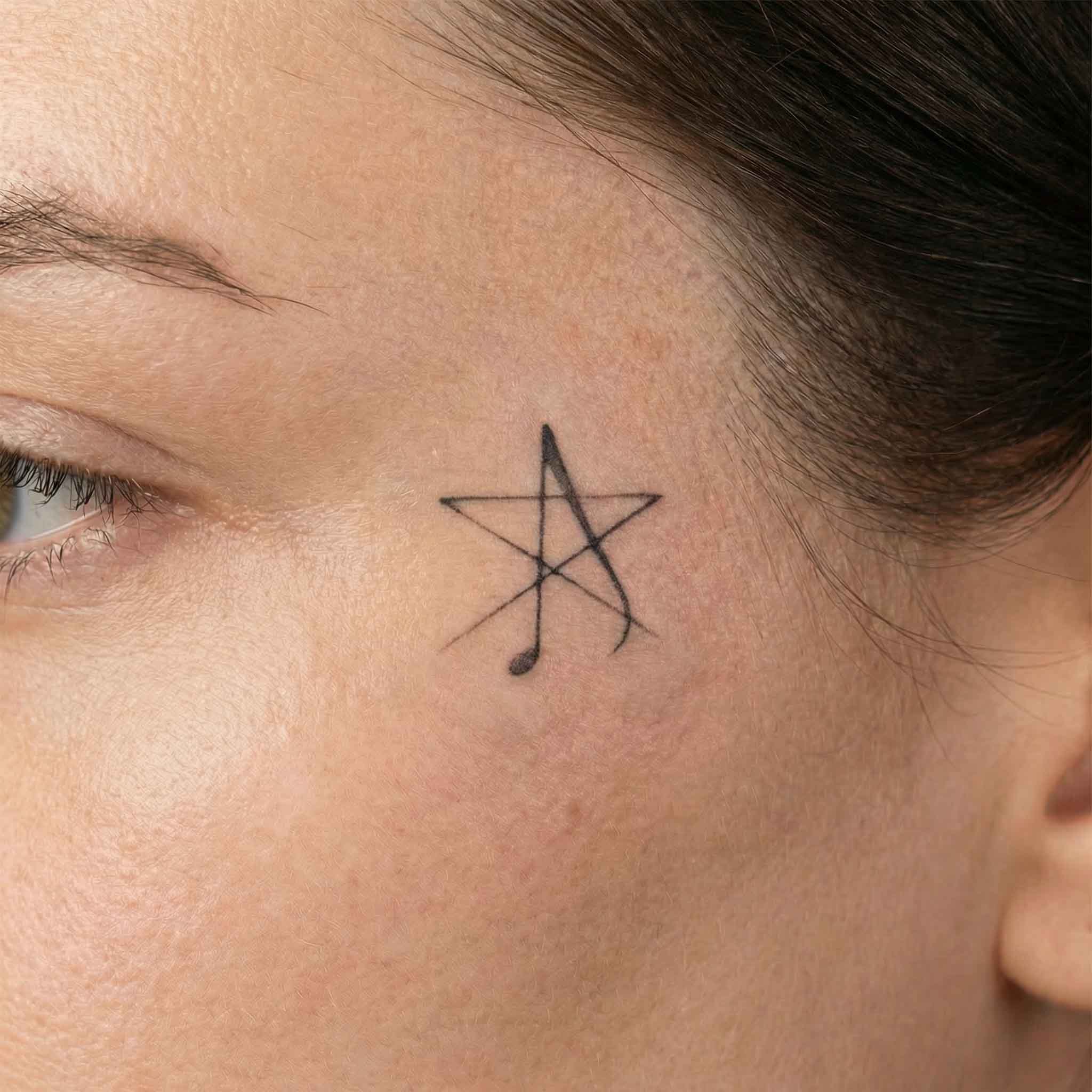 star music note herbal semi permanent tattoo on face skin