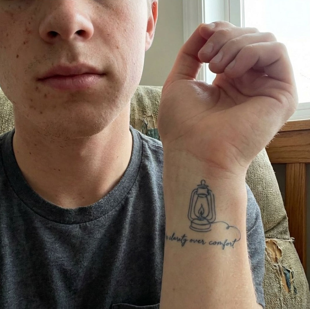 Close-up of small temporary tattoo on wrist