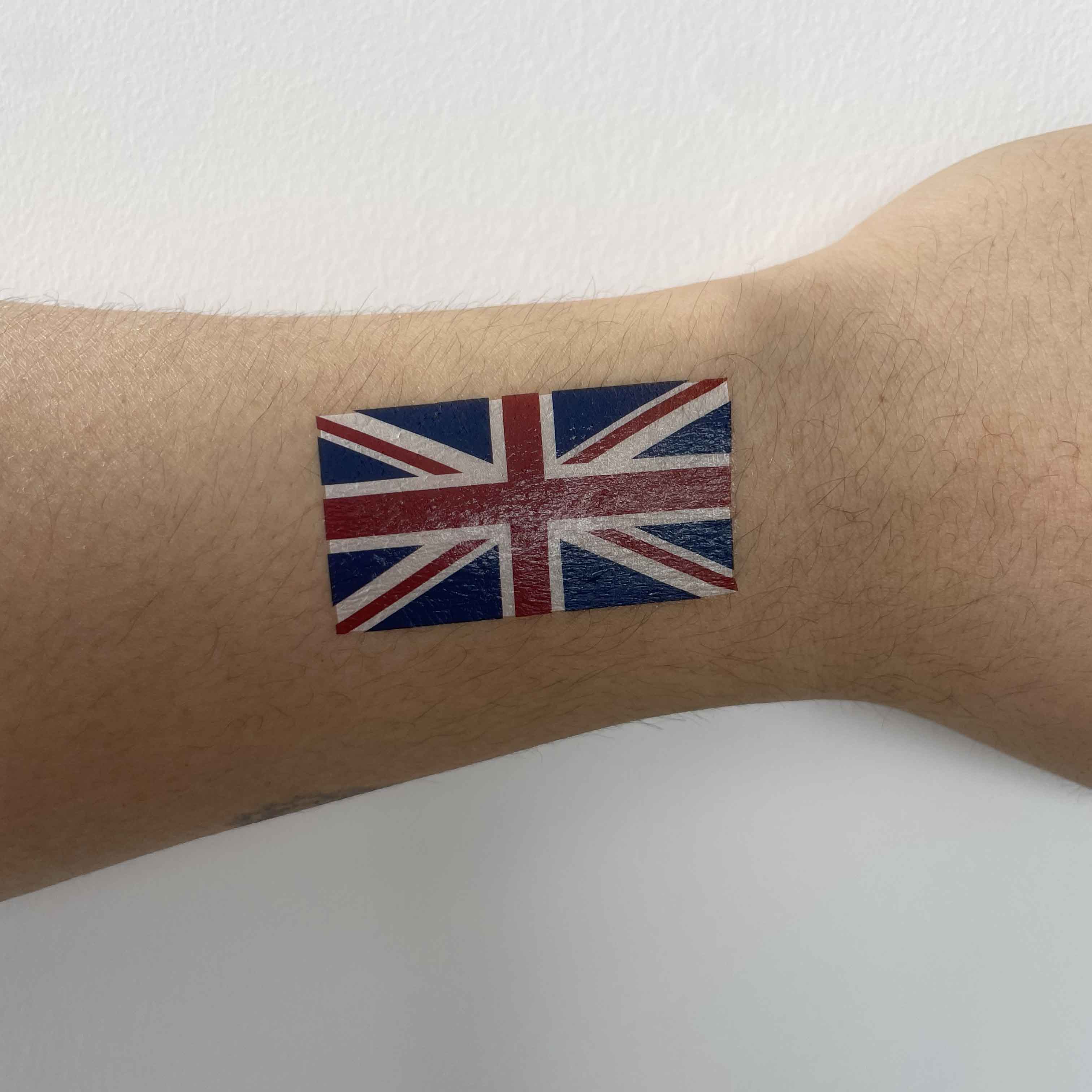 United Kingdom flag heart temporary tattoo worn on arm for football game day and fan outfit look